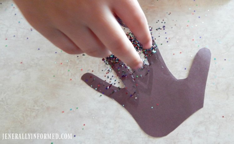 Gobble Gobble! Get ready for Thanksgiving with these adorable glitter hand print turkey puppets!