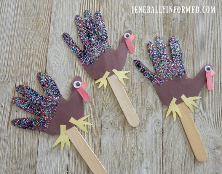 Gobble Gobble! Get ready for Thanksgiving with these adorable glitter hand print turkey puppets!