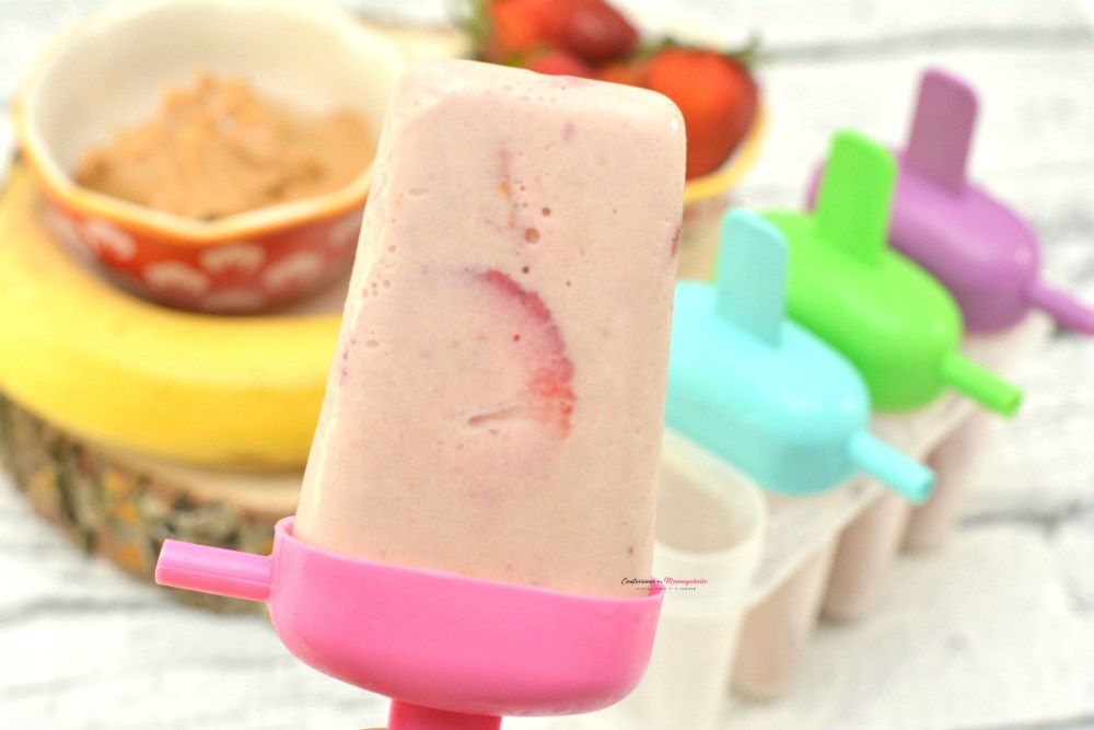 Peanut Butter And Jelly Popsicles Recipe from Confessions of a Mommyaholic.