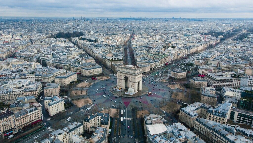 Arc de Triomphe in Paris courtesy Unsplah and Rodrigo Kugnharski.