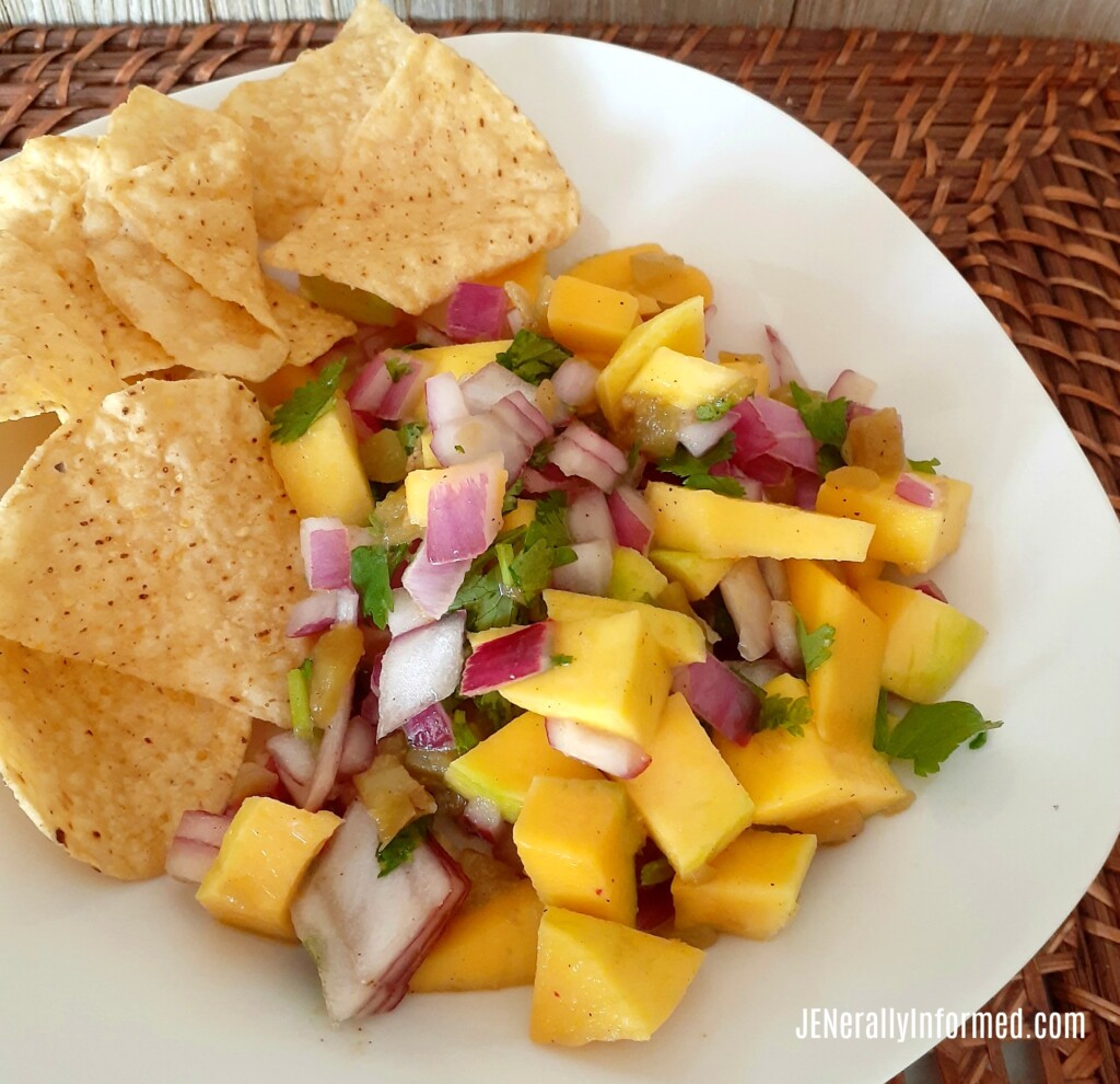Bursting with flavor! Grab this recipe for delicious and easy to make (only 7 ingredients) mango salsa. #cooking #recipes