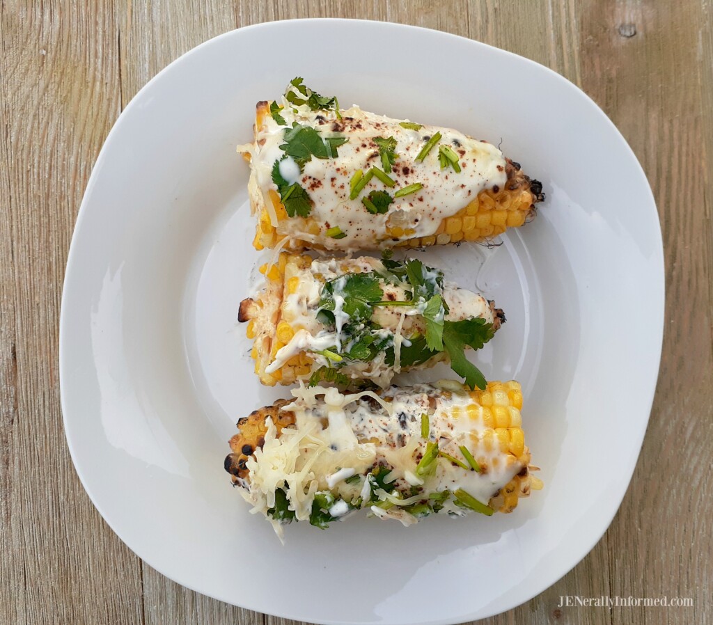 Here's how to make your own fire-roasted Grilled Mexican street corn at home! #grilling #summerrecipes