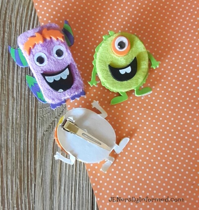 Spooky Halloween hair accessories! Easily make your own fuzzy monster hair clips.