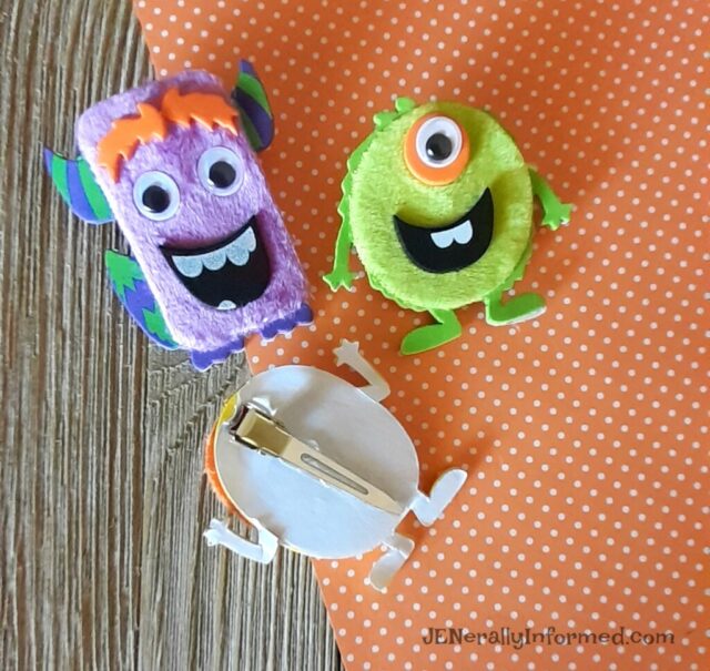 Spooky Halloween hair accessories! Easily make your own fuzzy monster hair clips.