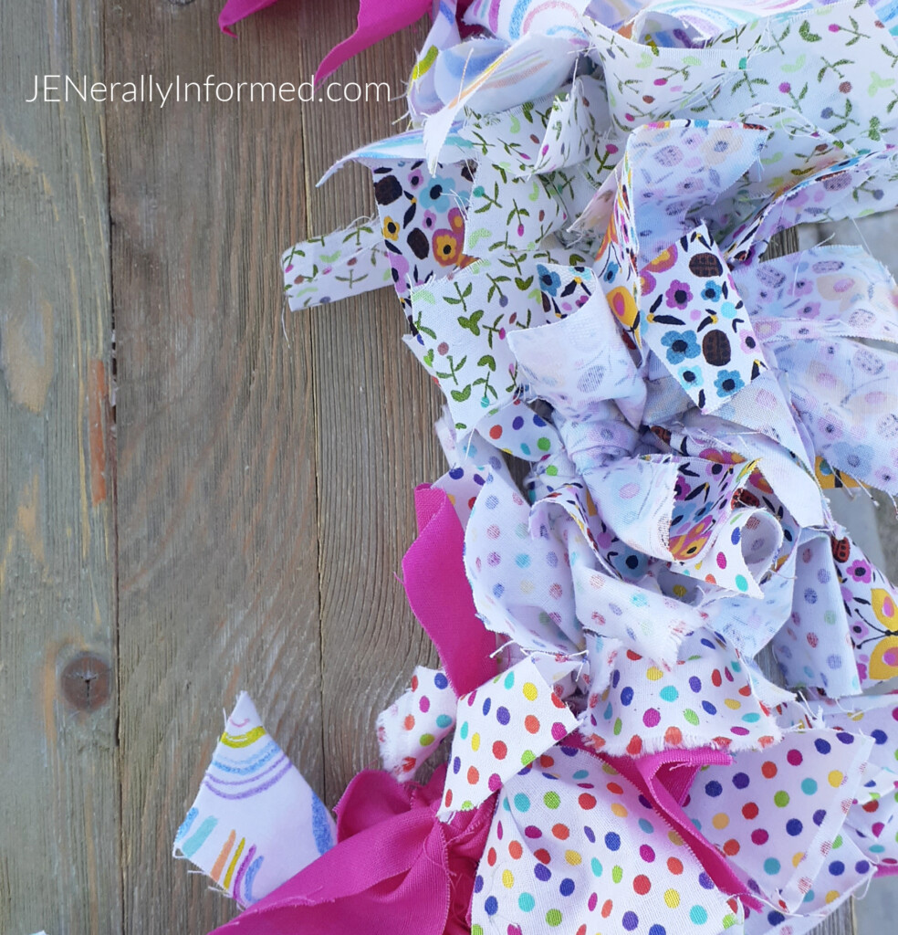 Here's how to make a super easy and cute Spring Rag Wreath for less than $10 dollars! #crafting #DIY #homedecorations