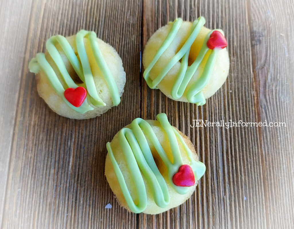 Warm any heart with these mini pineapple flavored with lime icing Grinch mini donuts!