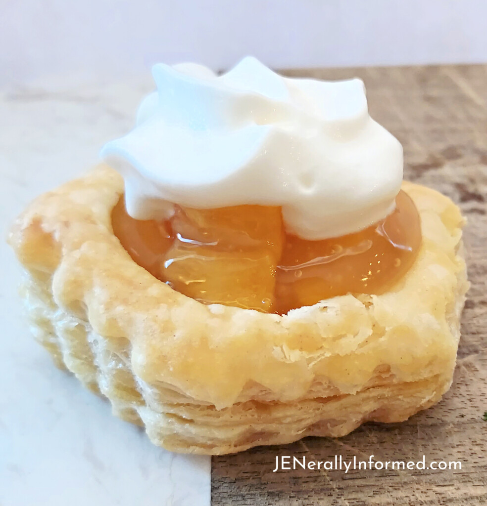 Easy to make Mini Peach Pie Pasty Puffs. With only three simple ingredients you can have delicious pies in less than 15 minutes!