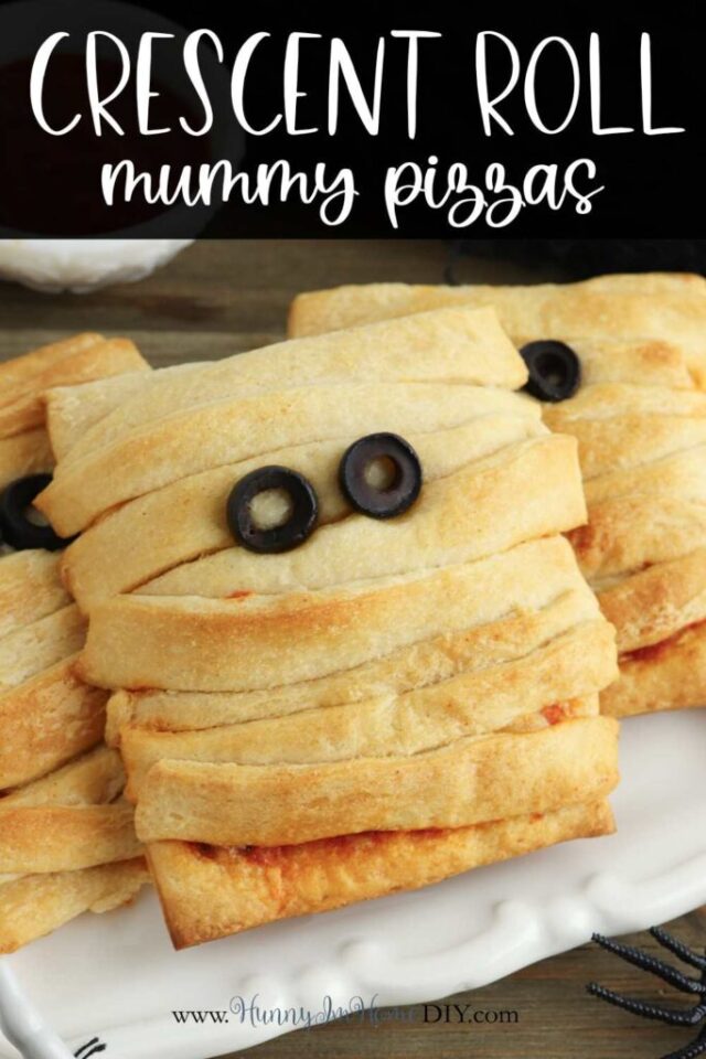 Easy Crescent Roll Mummy Pizza Pockets for Halloween from Hunny I'm Home.