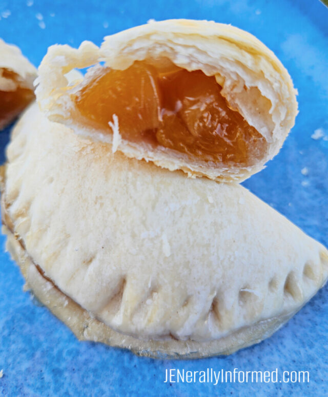 Learn how to make these simple Oven Baked or Air Fried Peach Empanadas with only 2 ingredients! #cooking #easydesserts