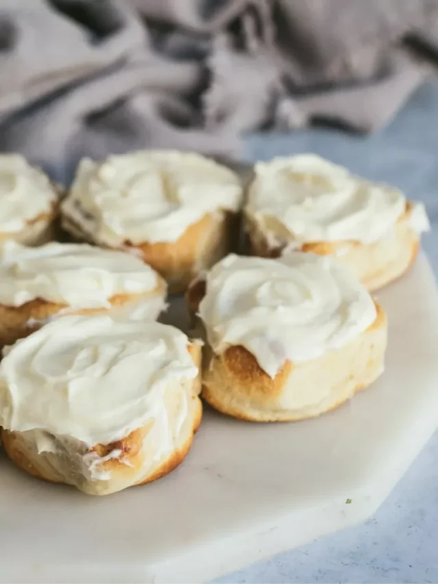 Air Fryer Cinnamon Rolls - Ready in Minutes by Walking on Sunshine Recipes.