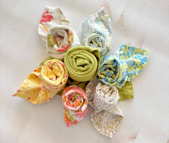 How to Fold a Rosebud Napkin by French Twist.