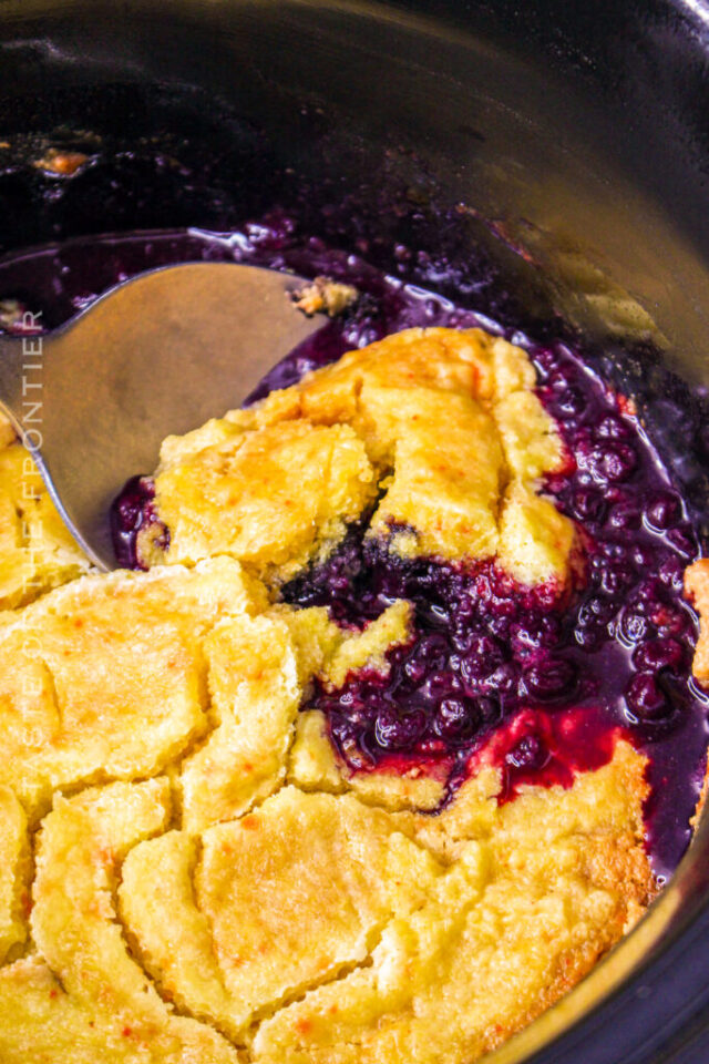 Slow Cooker Blueberry Cobbler by Yummi Haus.