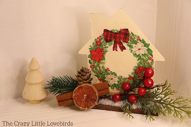 Dollar Tree DIY: Upcycled Metal House Christmas Decor by The Crazy Little Lovebirds.