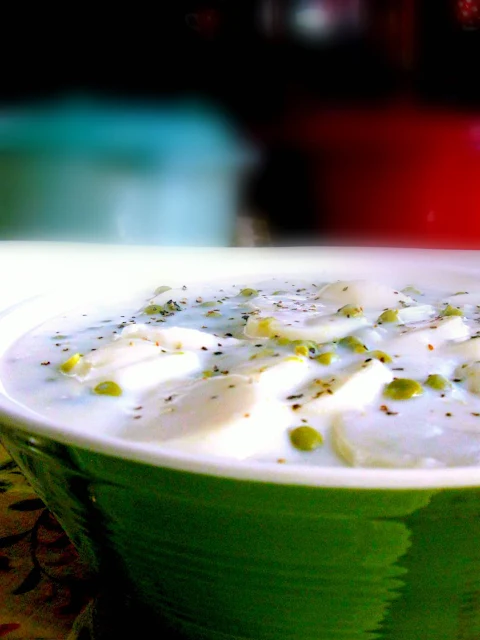 New Potatoes and Peas in a White Sauce from Celebrating Southern Cooking.